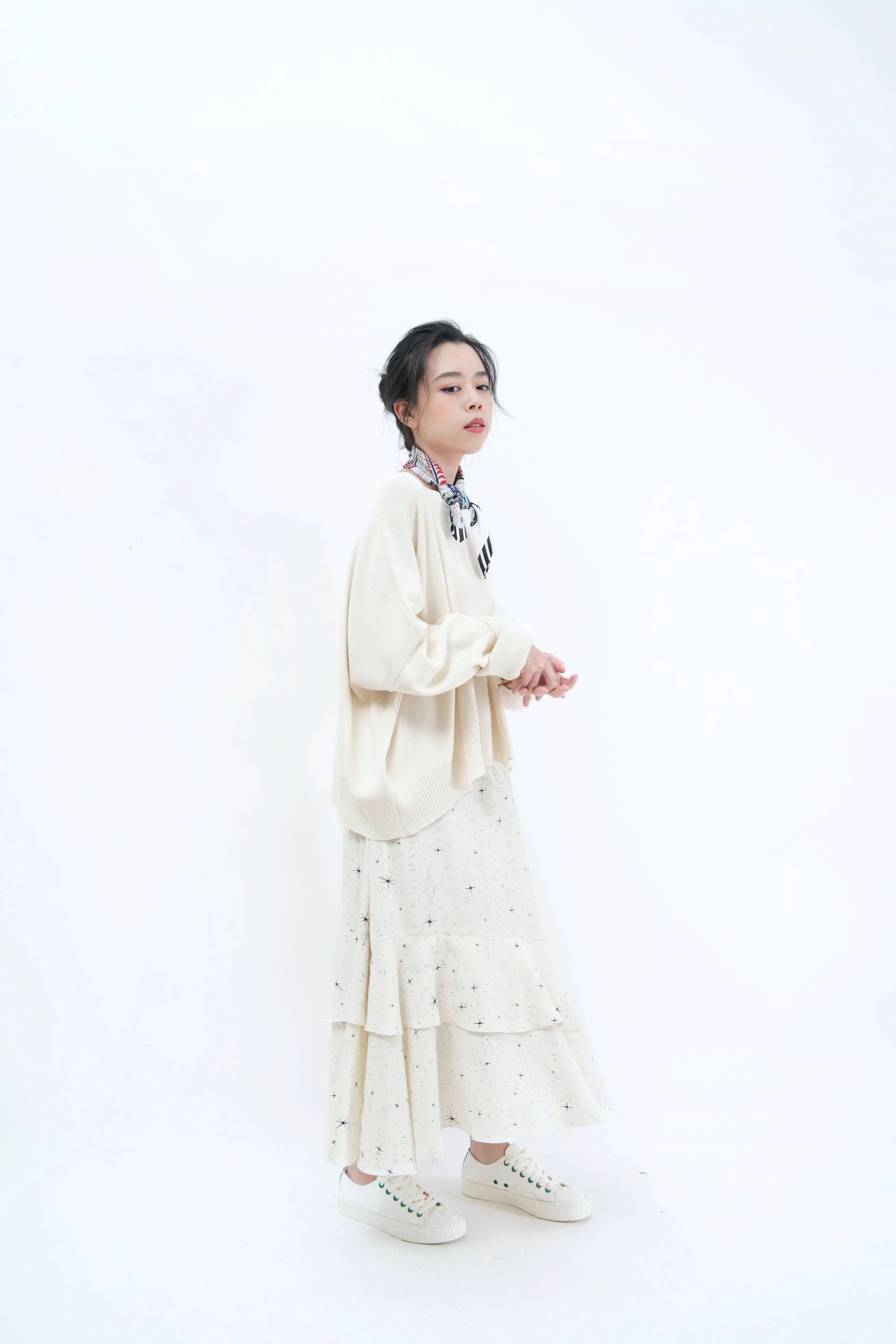 Cream sweater in loose cut