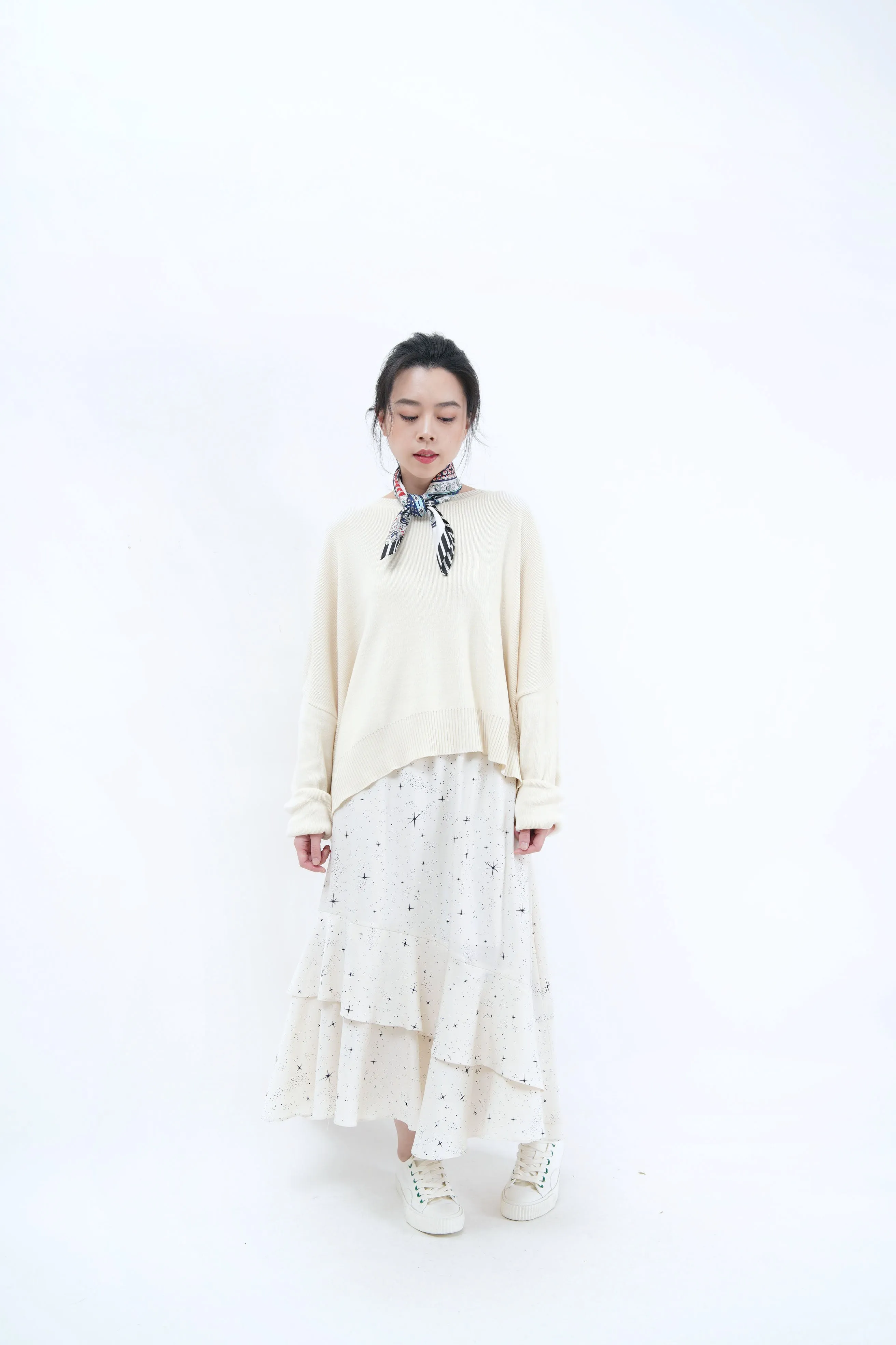 Cream sweater in loose cut
